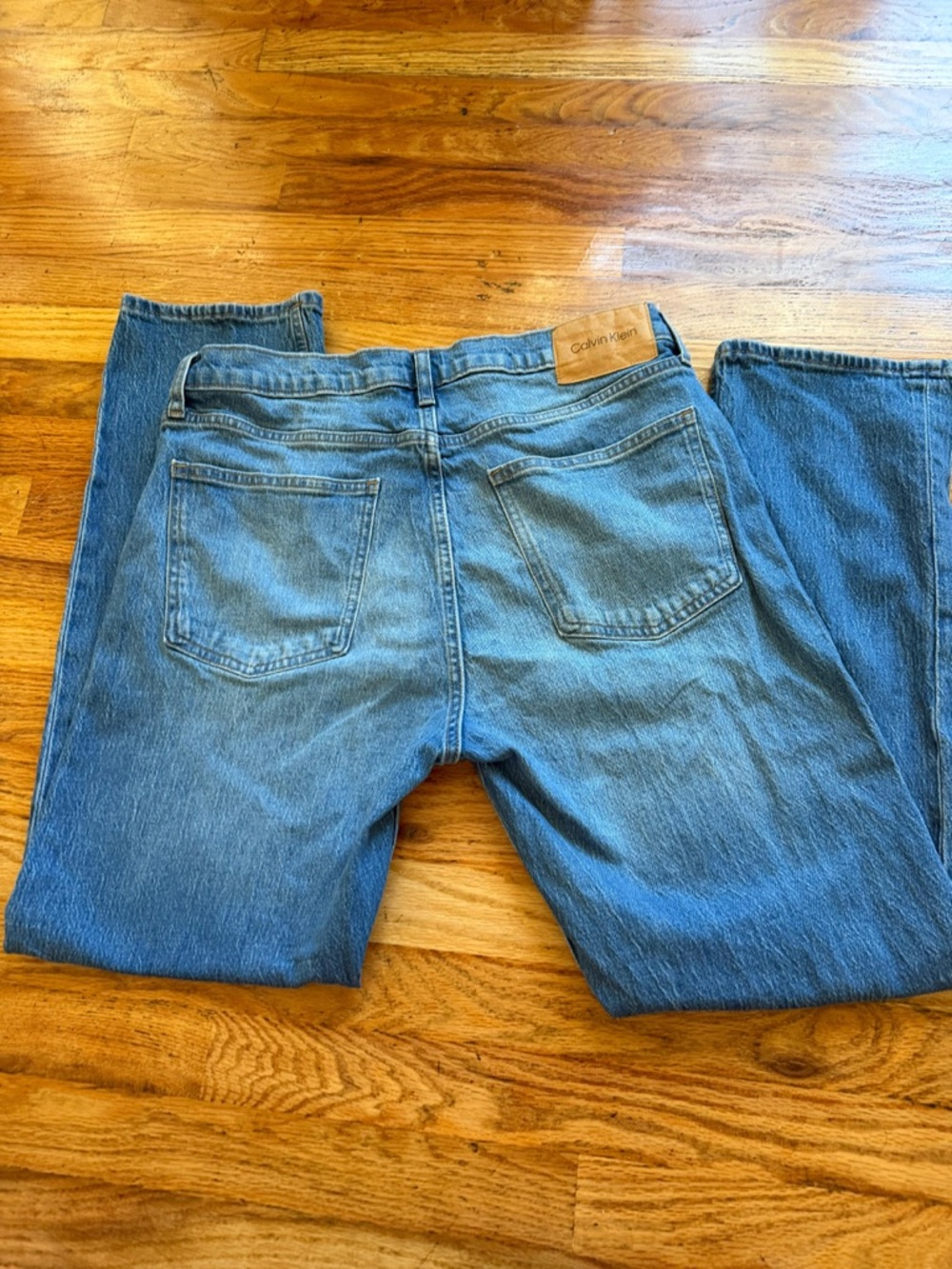 Calvin Klein Light Blue Denim Jeans with Red Logo Tag - Picture 7 of 7